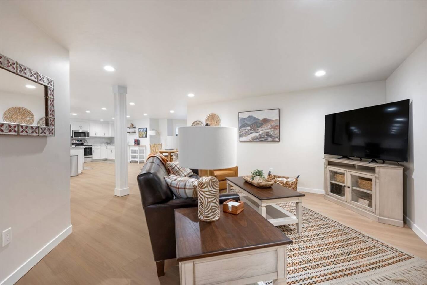 Long open living area running back to the kitchen