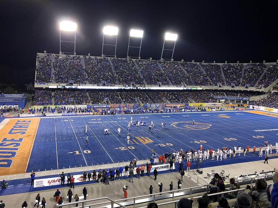 Night football game on the blue turf at Albertsons Stadium