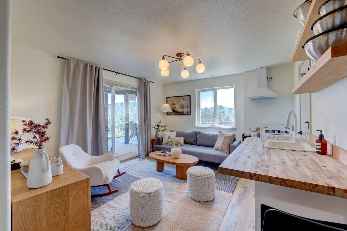 Open living area and kitchen with butcher block counter