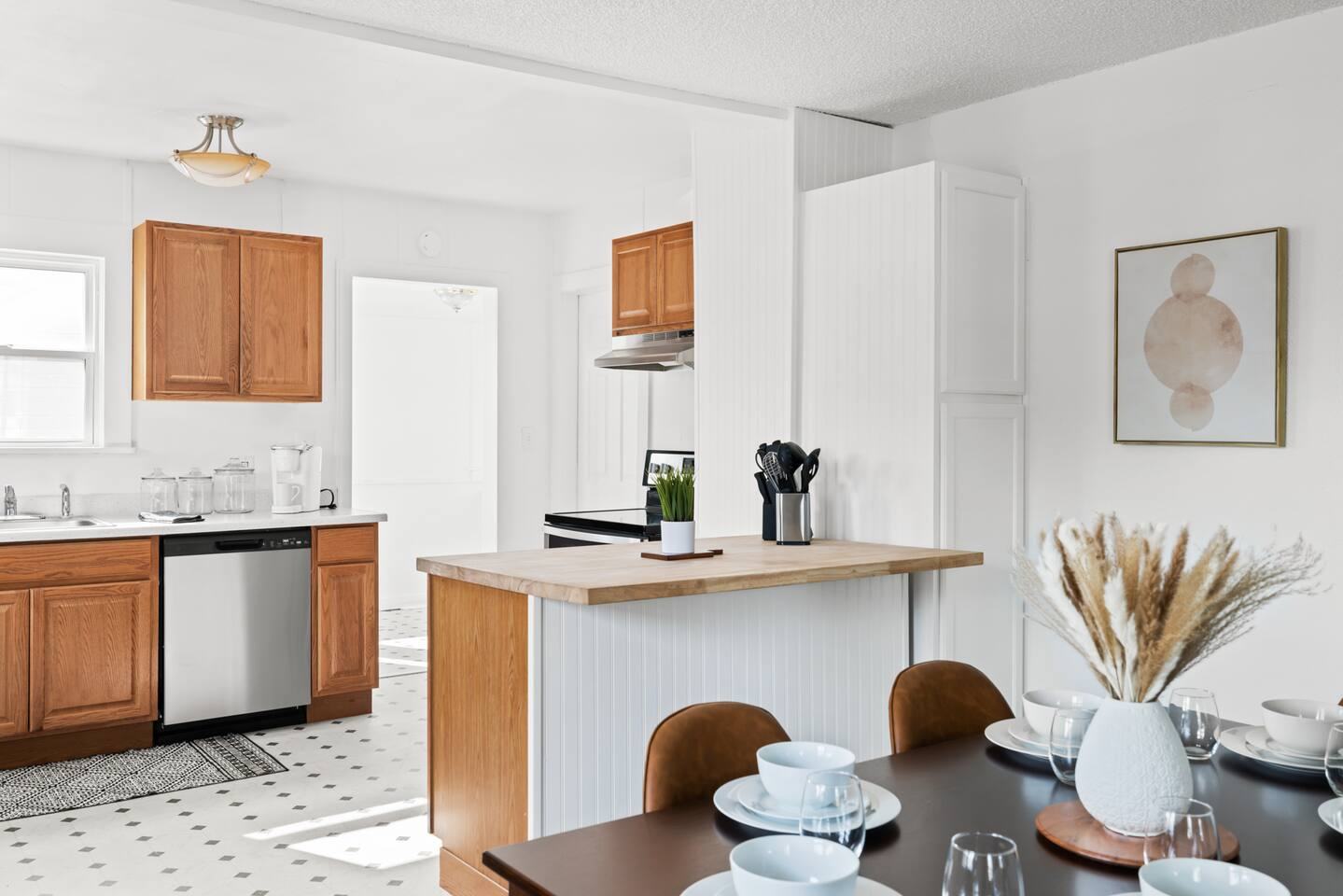 Kitchen with island and dining table