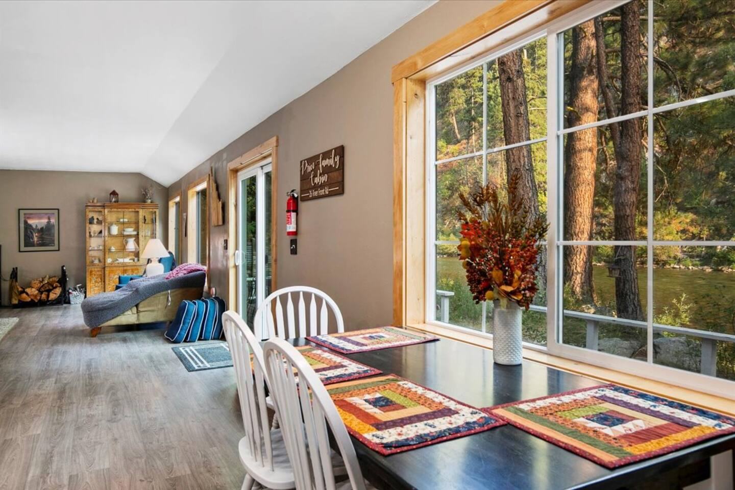 Dining table by the river-view window