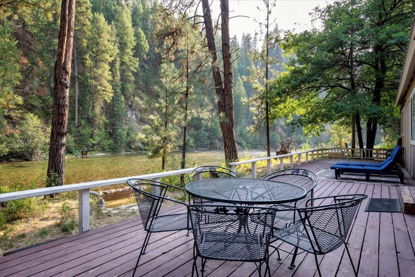 Patio dining on the riverside deck