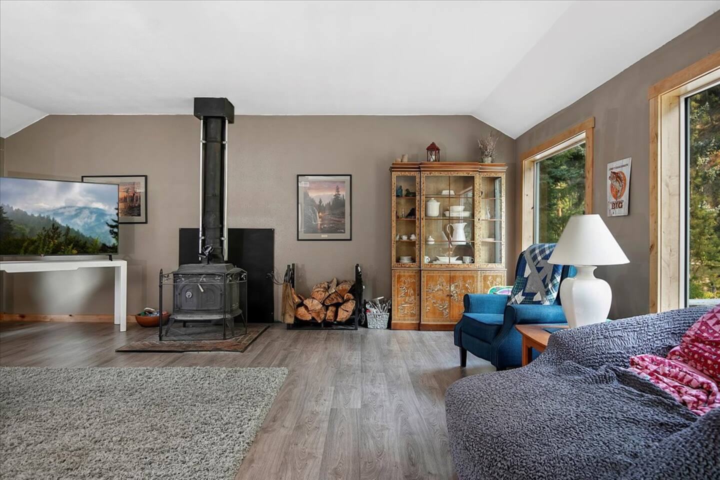 Open living area with wood stove