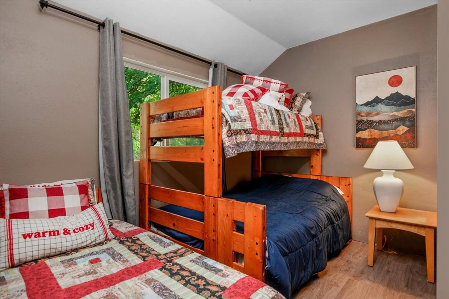 Bedroom 2 with a full-over-twin bunk bed and a twin bed