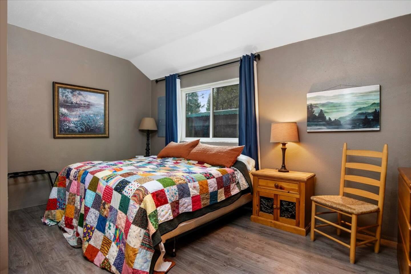 Bedroom 1 with a king bed and quilt