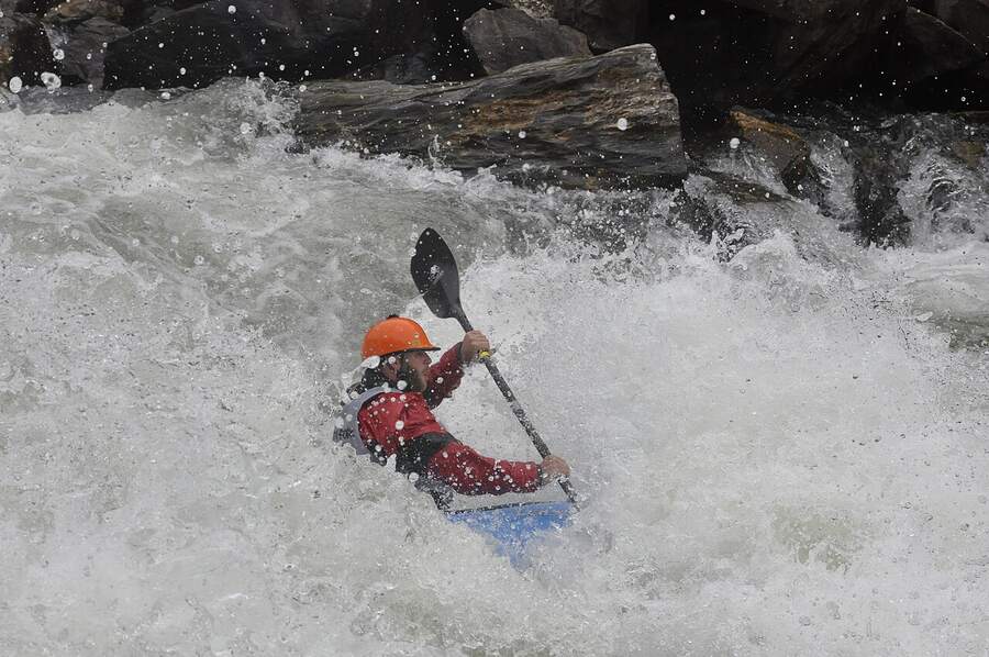Kayaker running whitewater on the South Fork Payette River