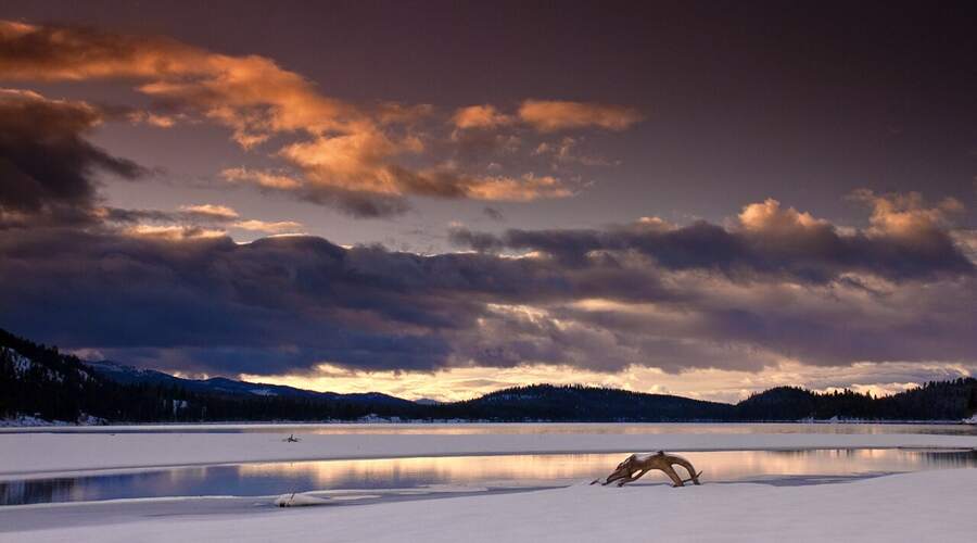 Sunrise over the north shore of Payette Lake in winter