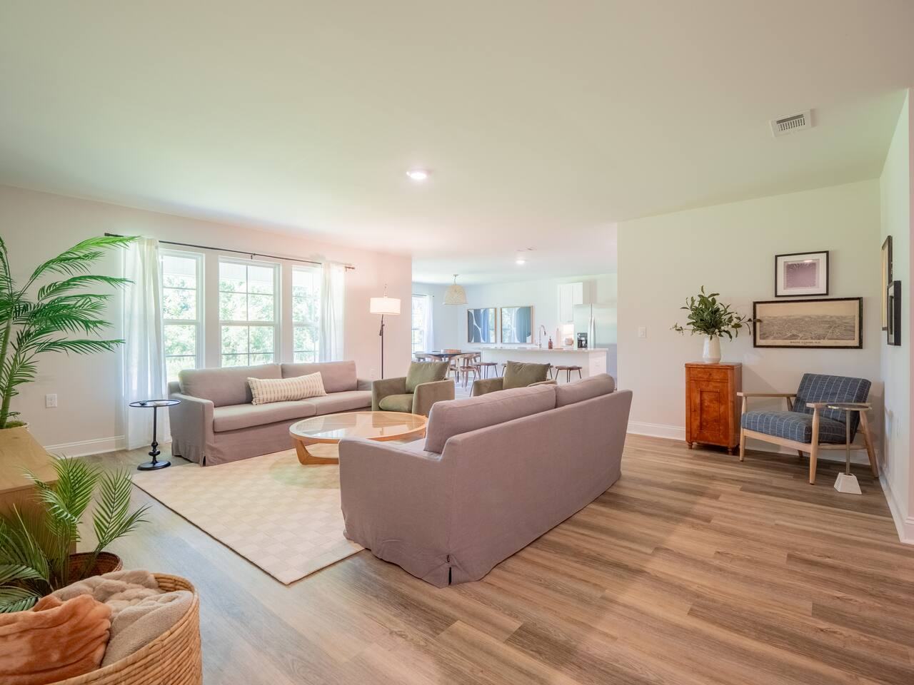 Living room with two sofas and reading chairs