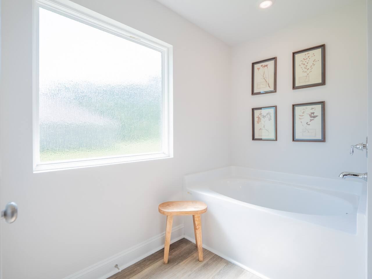 Freestanding soaking tub in the master bathroom